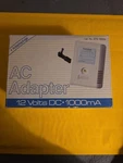 Radio Shack 273-1653B Adapter 12V 1000MA. Fixed Price $16.99.